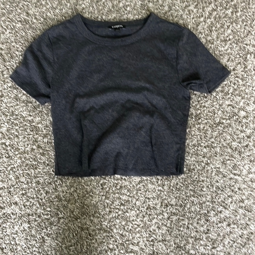 His is a cropped tee with nothing on it! Very easy to style and super cute!